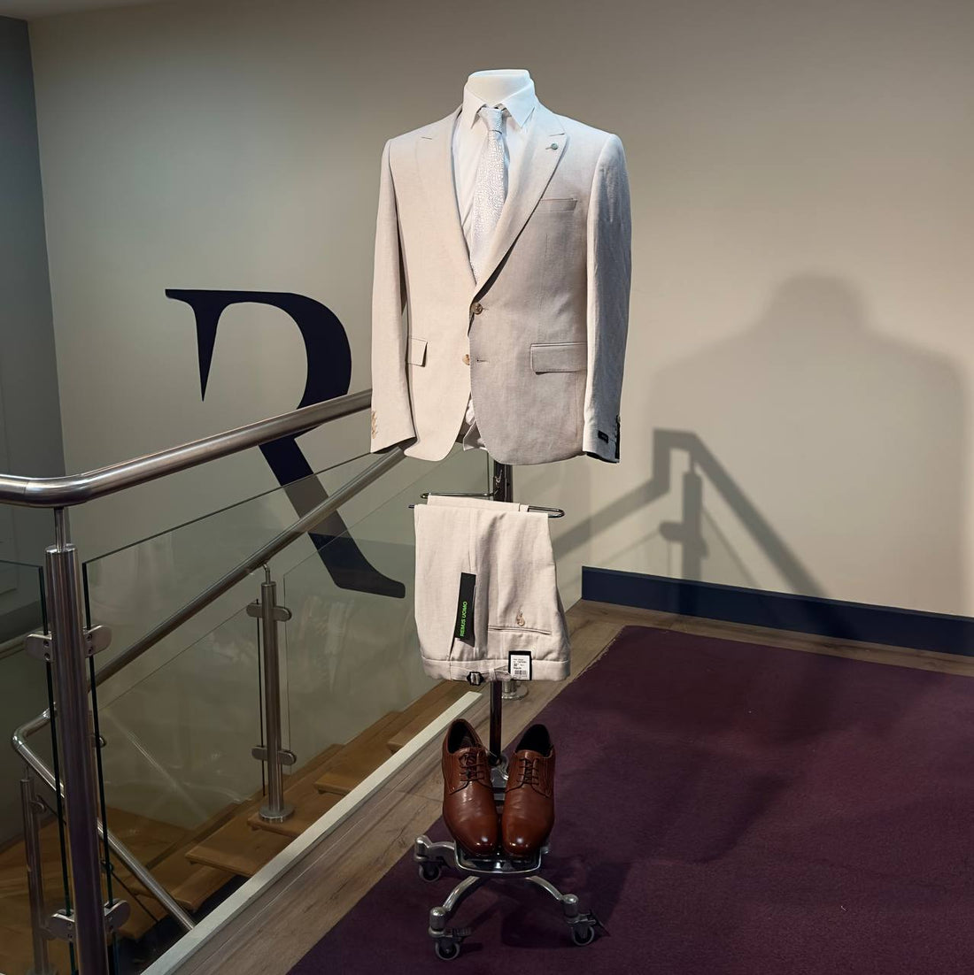 Stone linen wedding guest suit with tan brown Derby shoes at Ryle Menswear, Tralee
