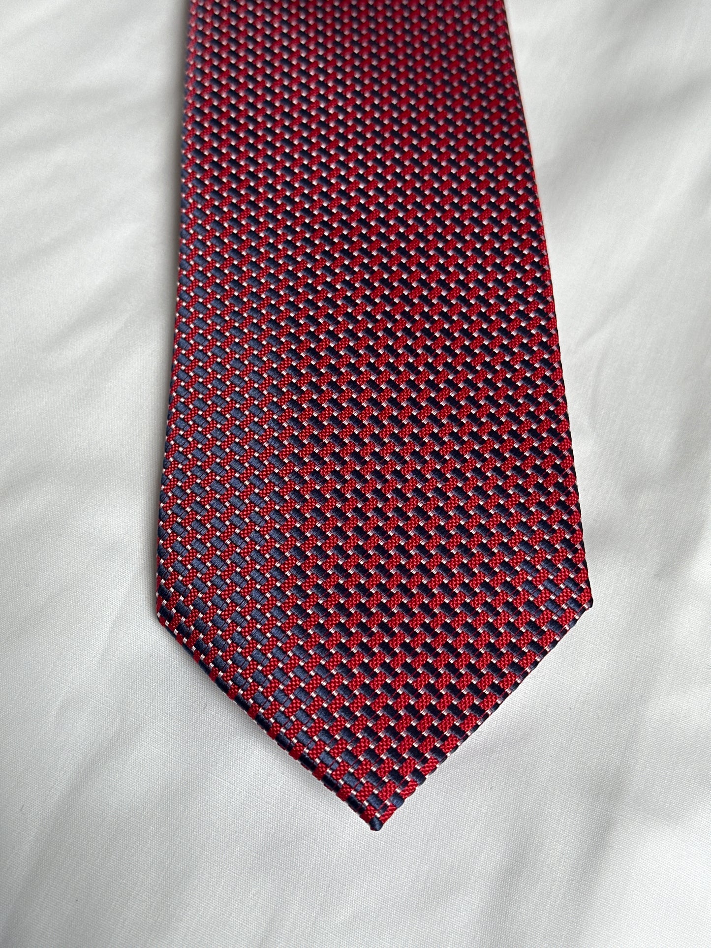 Red textured tie and matching pocket square at Ryle Menswear, Tralee