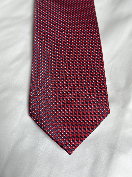Red textured tie and matching pocket square at Ryle Menswear, Tralee