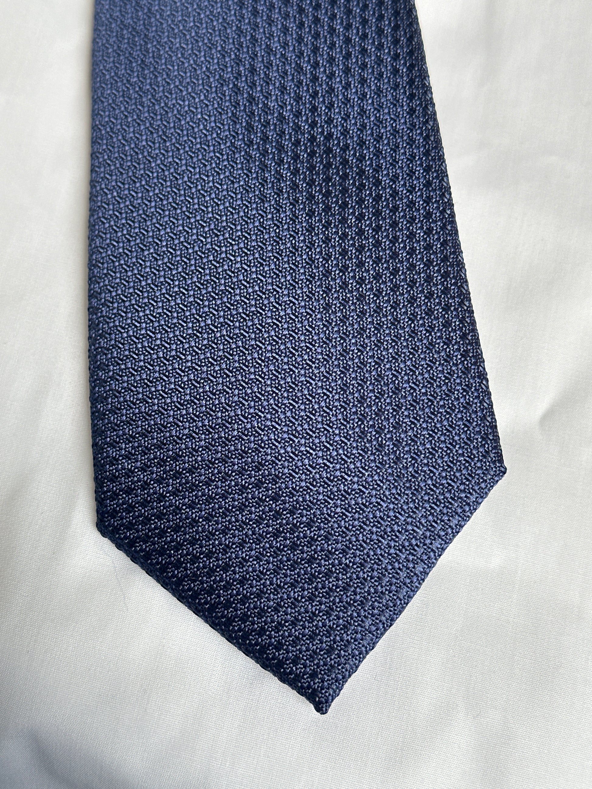 Navy textured tie and matching pocket square at Ryle Menswear, Tralee