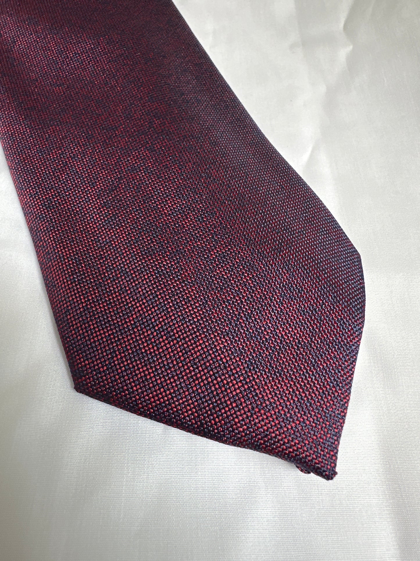 Red woven tie and matching pocket square at Ryle Menswear, Tralee