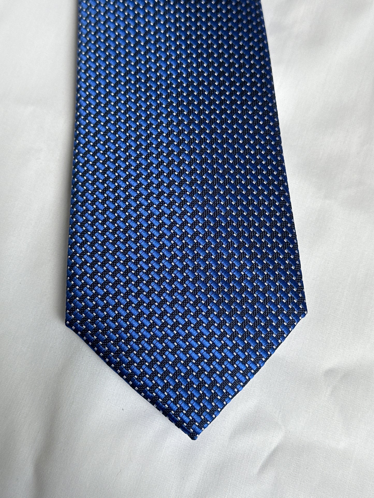 Blue textured tie and matching pocket square at Ryle Menswear, Tralee