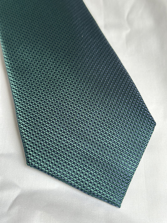 Dark green woven tie and matching pocket square at Ryle Menswear, Tralee