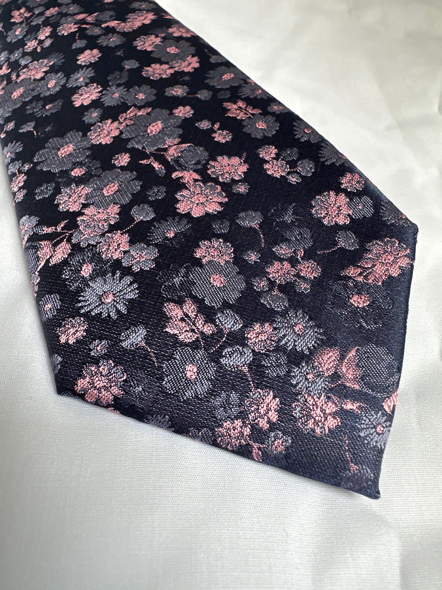 Navy bold floral tie and matching pocket square at Ryle Menswear, Tralee