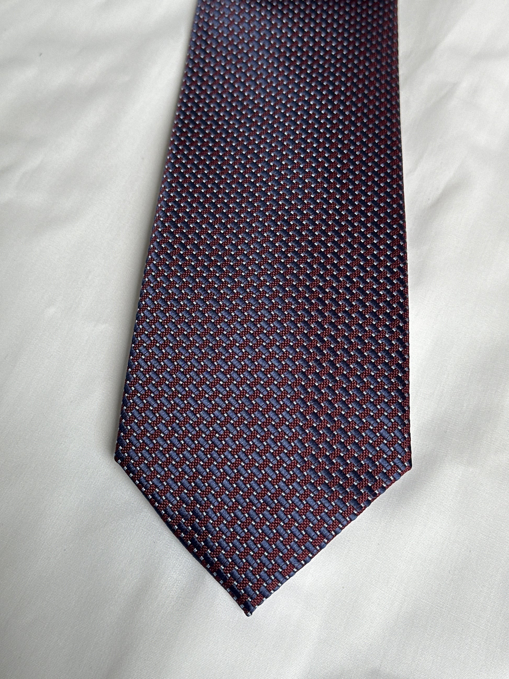 Wine textured tie and matching pocket square at Ryle Menswear, Tralee