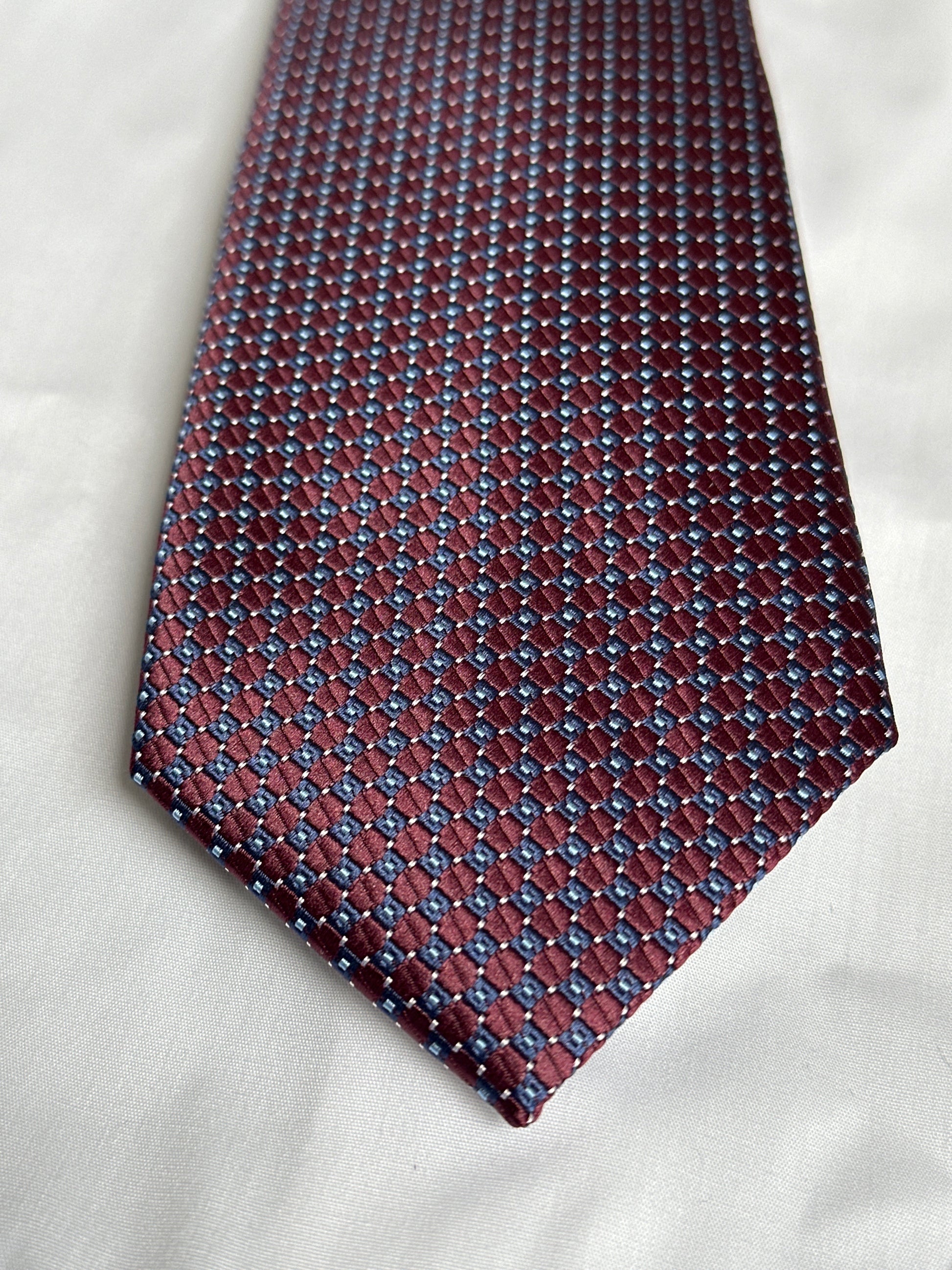 Red spot tie and matching pocket square at Ryle Menswear, Tralee