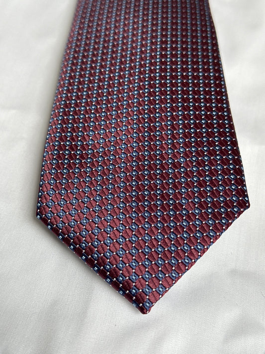 Red spot tie and matching pocket square at Ryle Menswear, Tralee