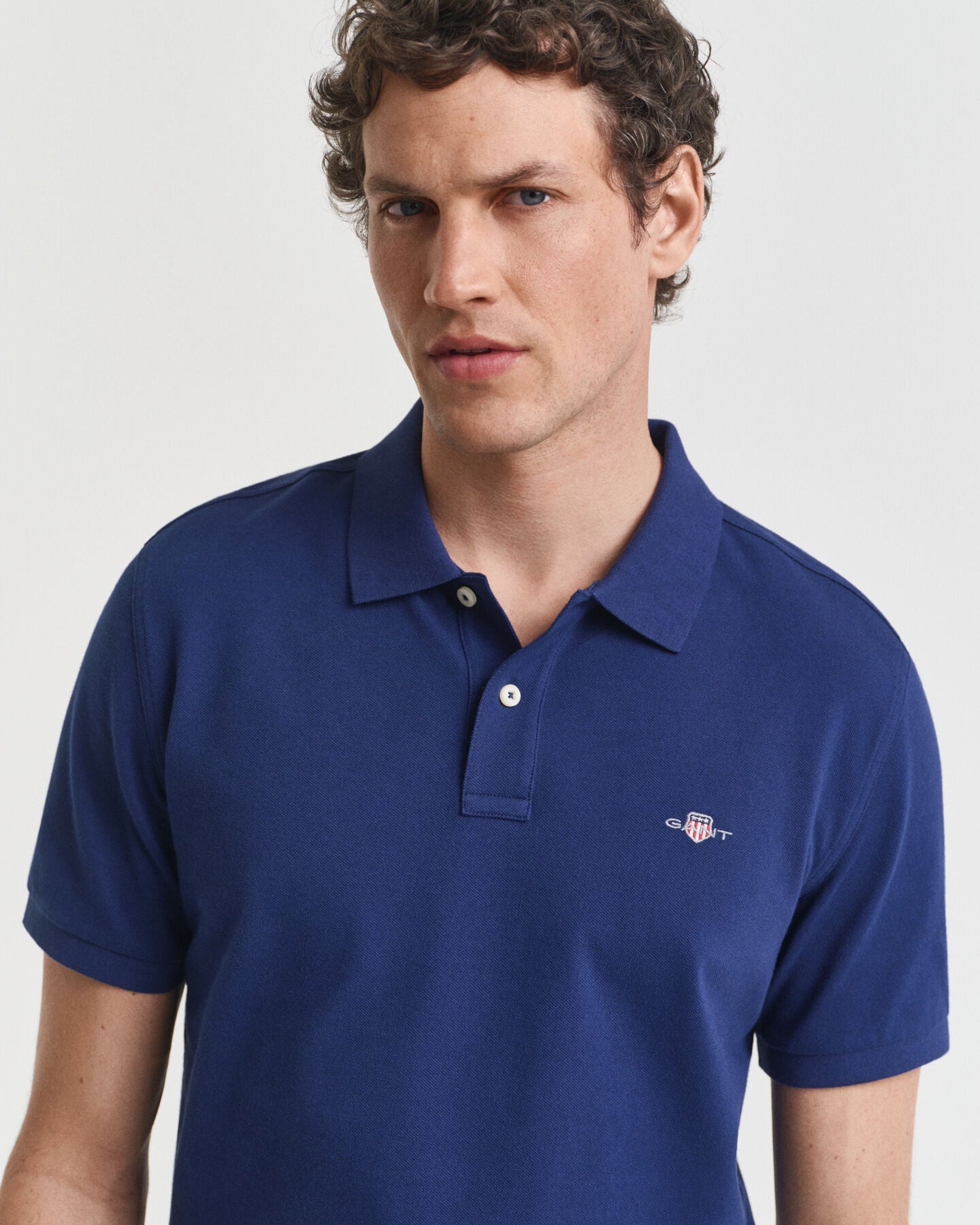Gant Regular Fit Shield Piqué Polo Shirt - Persian Blue time__1749805528__202503-2210-423-crmodel-fv-1
